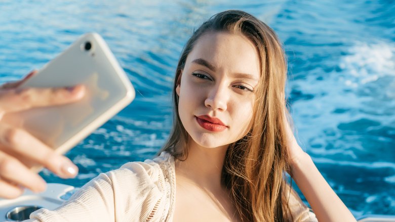 Woman taking selfie