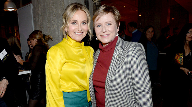Eve Plumb and Maureen McCormick posing together in 2019