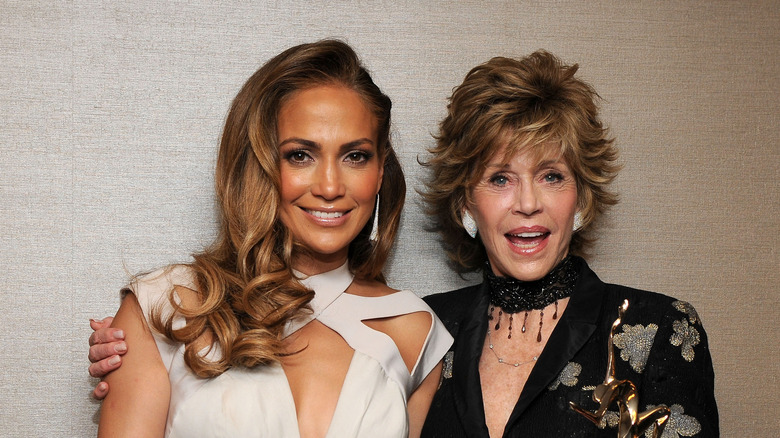 Jennifer Lopez and Jane Fonda smiling together.