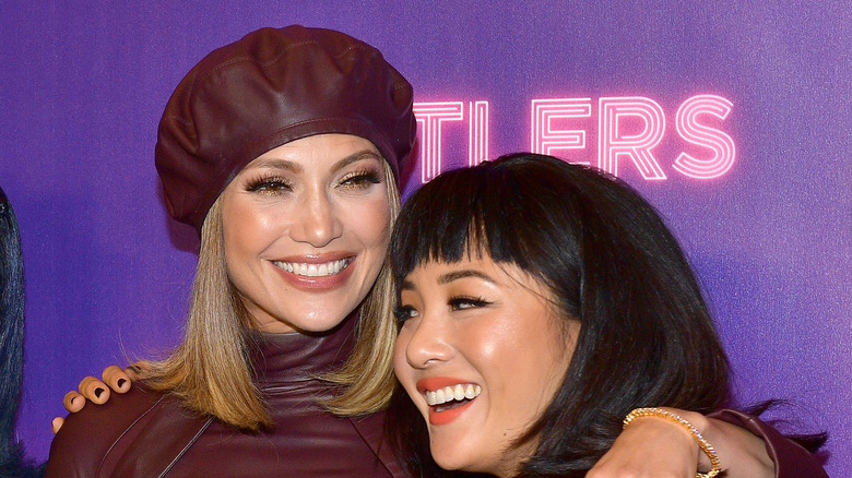 Jennifer Lopez and Constance Wu smiling and embracing in 2019