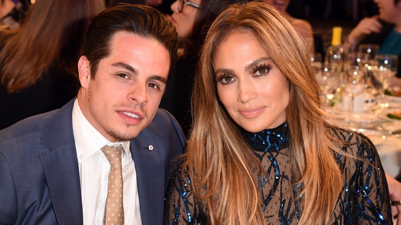 Jennifer Lopez and Casper Smart posing at formal awards dinner