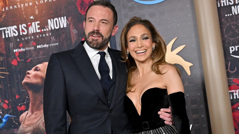 Ben Affleck and Jennifer Lopez smiling at 