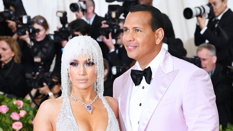 Jennifer Lopez and partner Alex Rodriguez pose for a photo at the Met Gala