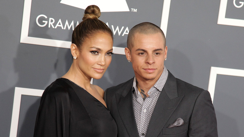 Jennifer Lopez and boyfriend Casper Smart gaze at cameras at an award show