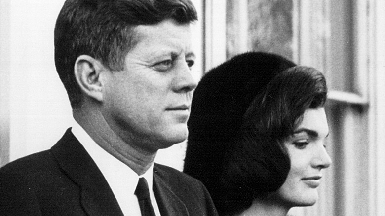 JFK and Jackie Kennedy staring into distance