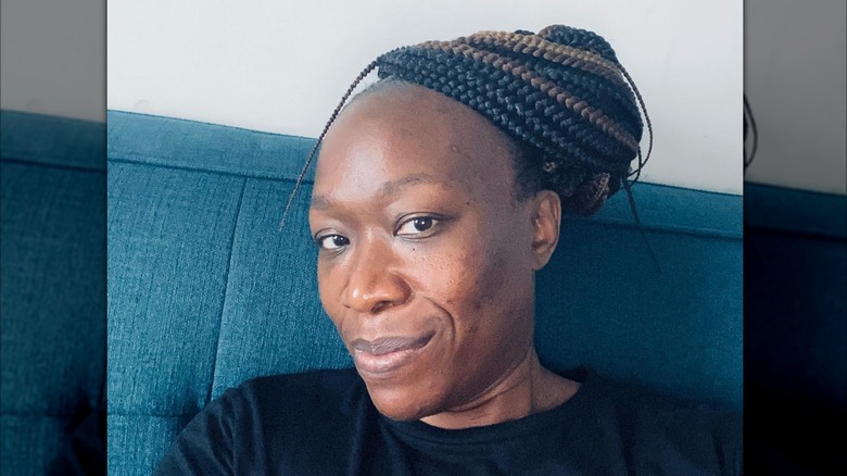 Joy Reid smiling slightly