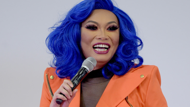 Jujubee smiling in orange