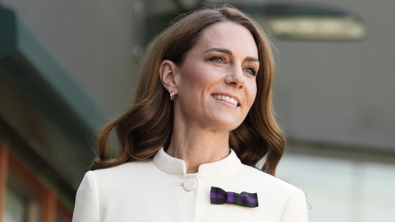 Kate Middleton smiling and looking slightly to her left