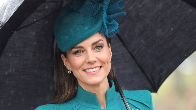 Kate Middleton blue suit umbrella