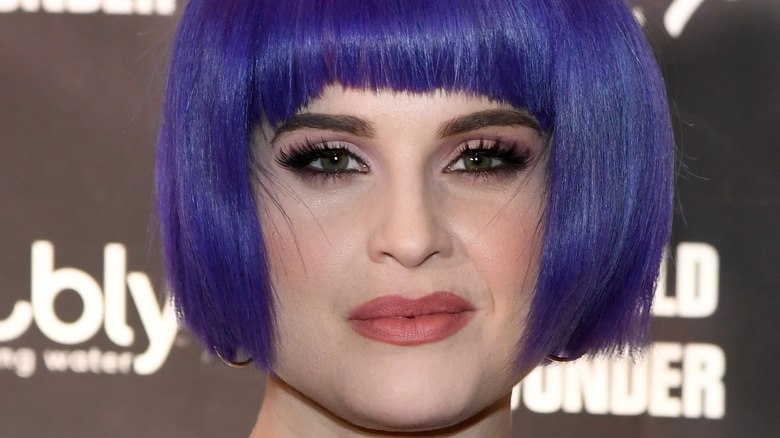 Kelly Osbourne posing, blue hair