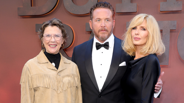Annette Bening, Cole Hauser, and Kelly Reilly posing together at a premiere