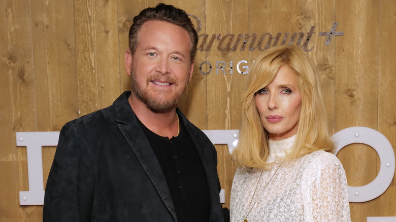 Cole Hauser and Kelly Reilly posing together at an event