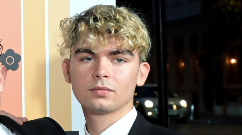 Rudy Law walking the red carpet at an event