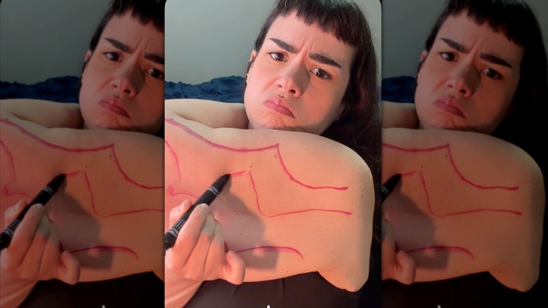 Amber Rachdi embracing their loose skin