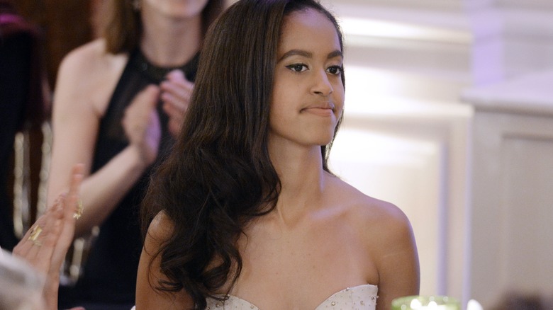 Malia Obama sitting in gown 