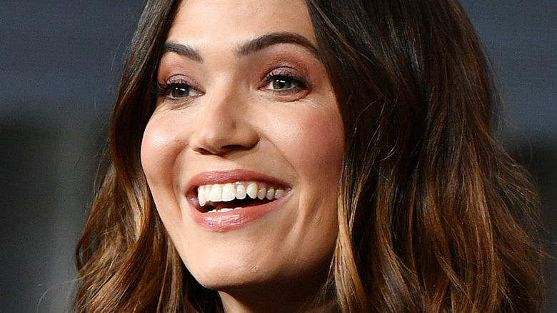 Mandy Moore smiling with hair down