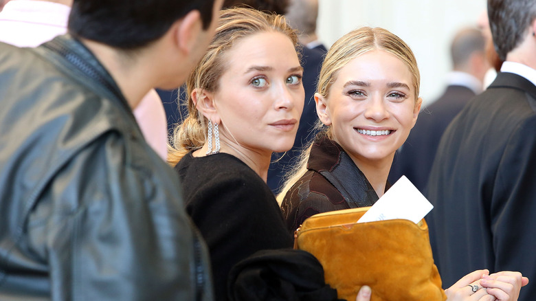 Mary-Kate Olsen and Ashley Olsen at the 2014 Anna Wintour Costume Center Grand Opening