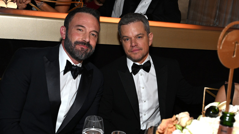 Matt Damon and Ben Affleck in bowties and black formals