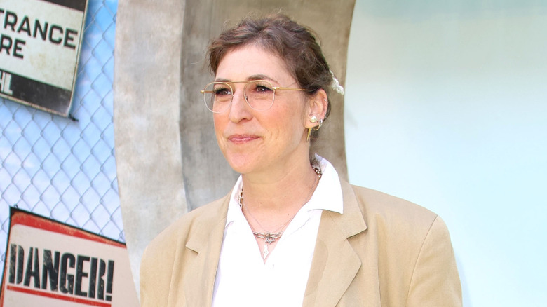 Mayim Bialik posing at a screening in 2024