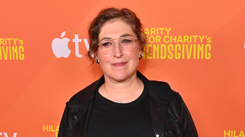 Mayim BIalik posing at an event in 2025