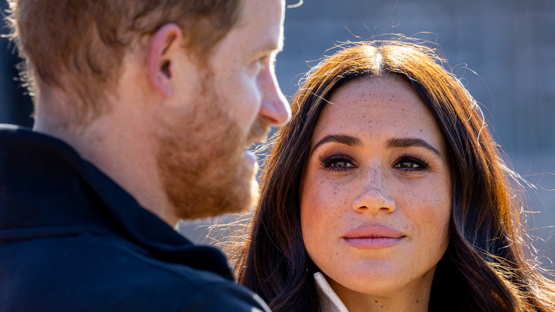 Meghan Markle staring lovingly at Prince Harry