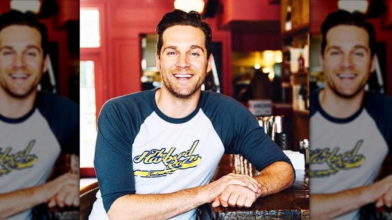Chef Cory Vitiello smiling in an Instagram photo taken in Toronto in 2016.