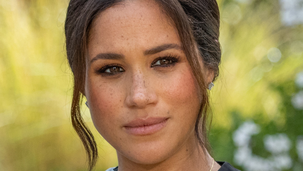 Meghan Markle looking serious during interview with Oprah