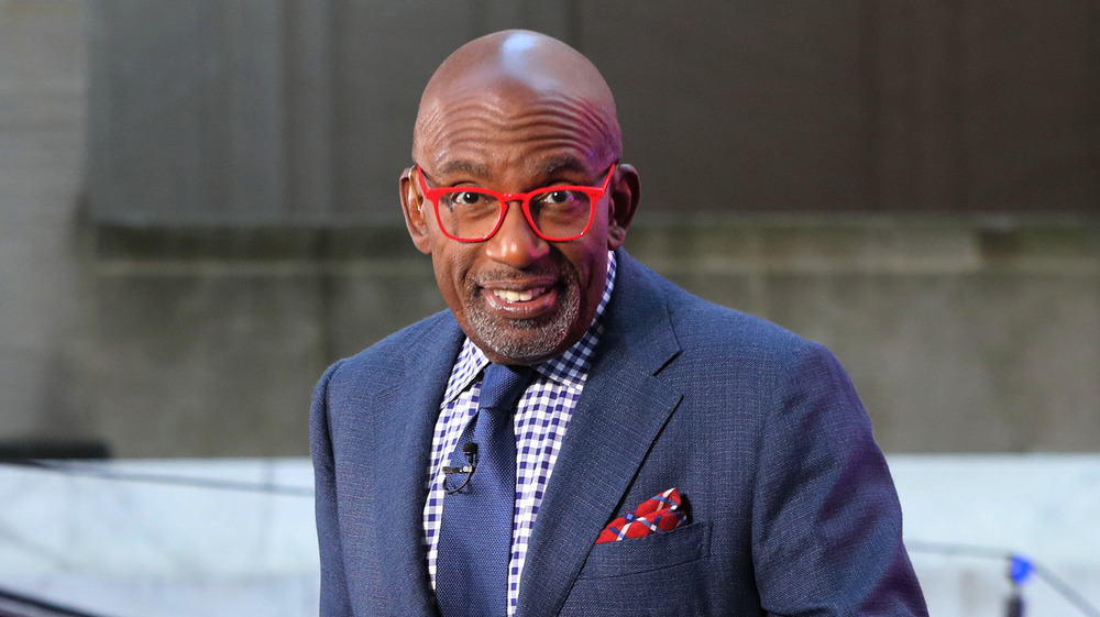 Al Roker on television wearing red glasses