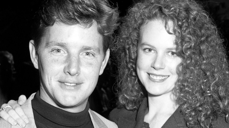 Tom Burlinson and Nicole Kidman posing together and smiling