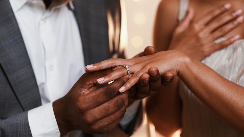 Engagement ring on finger