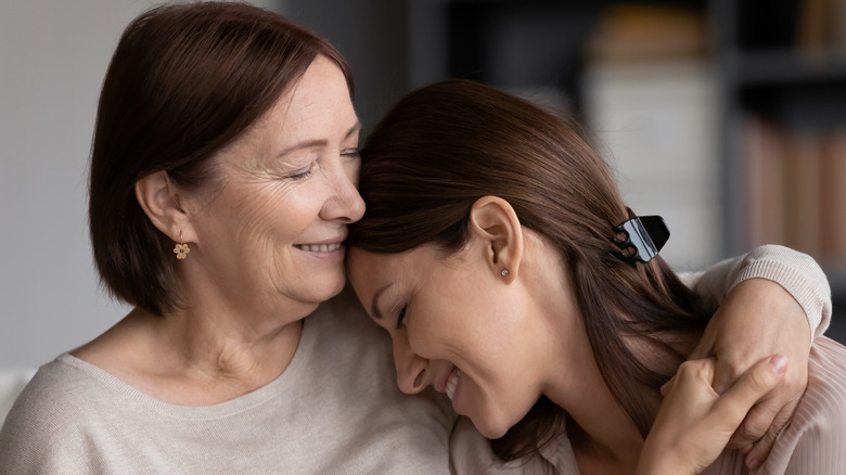 Mom and daughter hugging