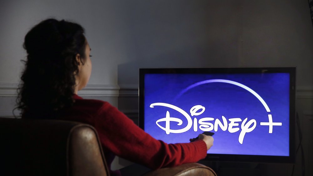 Woman watching a Disney movie 