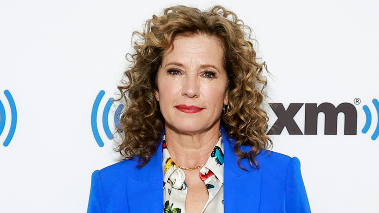 Nancy Travis posing