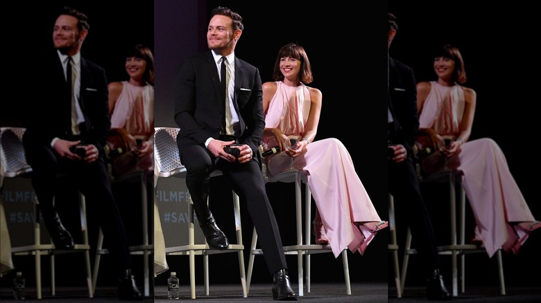 Sam Heughan and Caitriona Balfe smiling