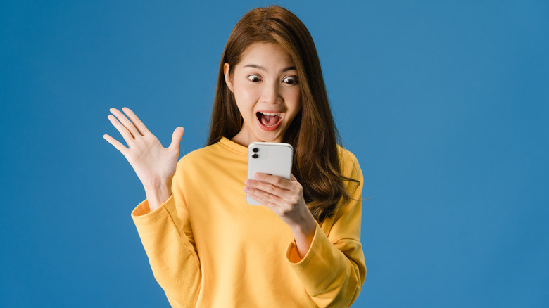 woman checking phone 