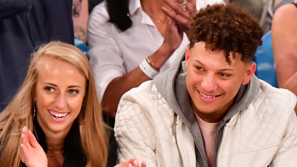 Patrick Mahomes and fiancée Brittany Matthews take in a basketball game