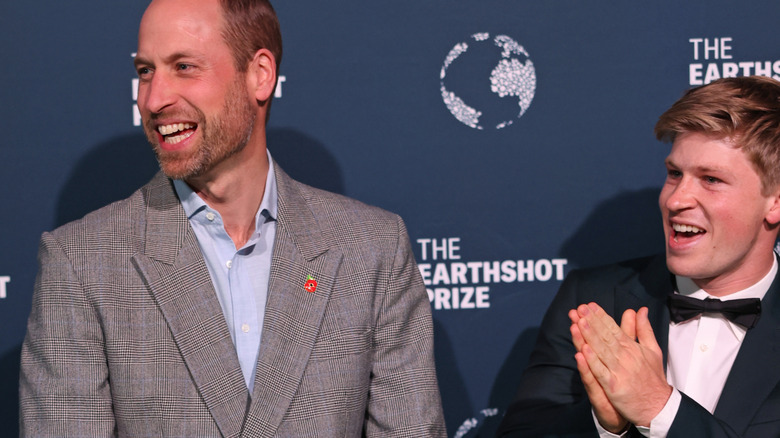 Prince William and Robert Irwin laughing together at an event