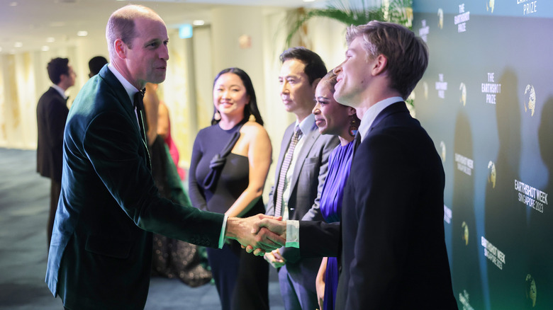 Prince William shaking hands with Robert Irwin