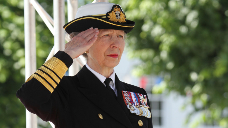 Princess Anne standing in salute