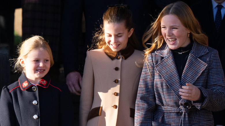 Princess Charlotte exiting the 2025 Christmas service with her cousins, Mia and Lena Tindall