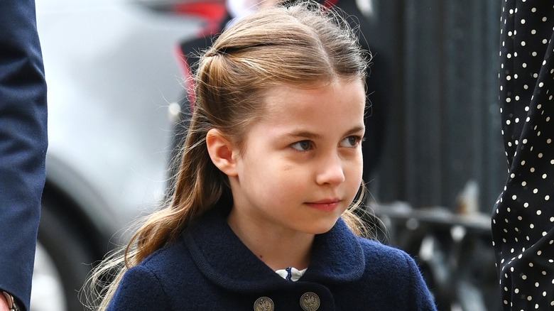 Princess Charlotte wearing a navy coat at Thanksgiving Service in 2022