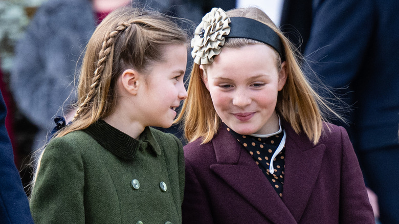 Princess Charlotte and Mia Tindall laughing