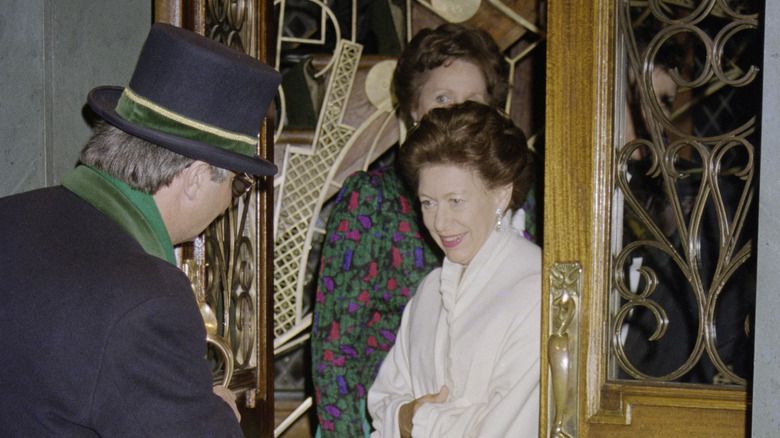 Doorman greeting Princess Margaret