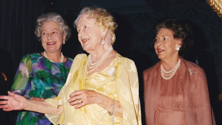 Queen Elizabeth and Princess Margaret with their mother