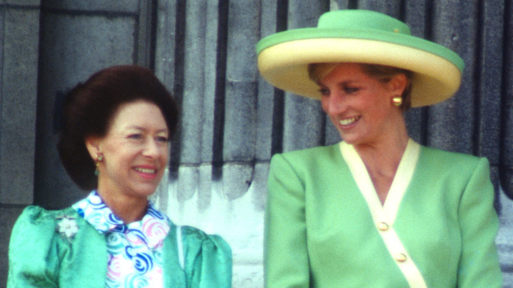 Princess Diana smiling at Princess Margaret