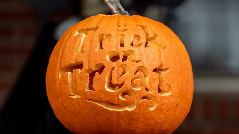 Pumpkin with "Trick or Treat" carved into it