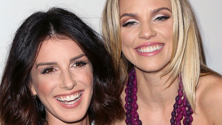 Shenae Grimes-Beech and AnnaLynne McCord smiling