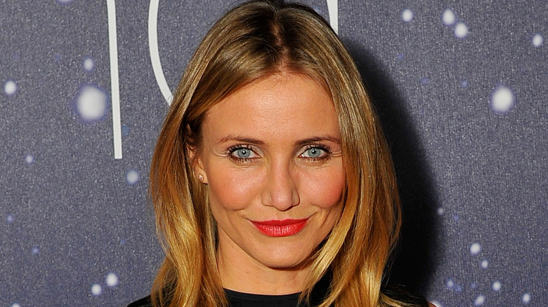 Closeup of Cameron Diaz posing on step-and-repeat