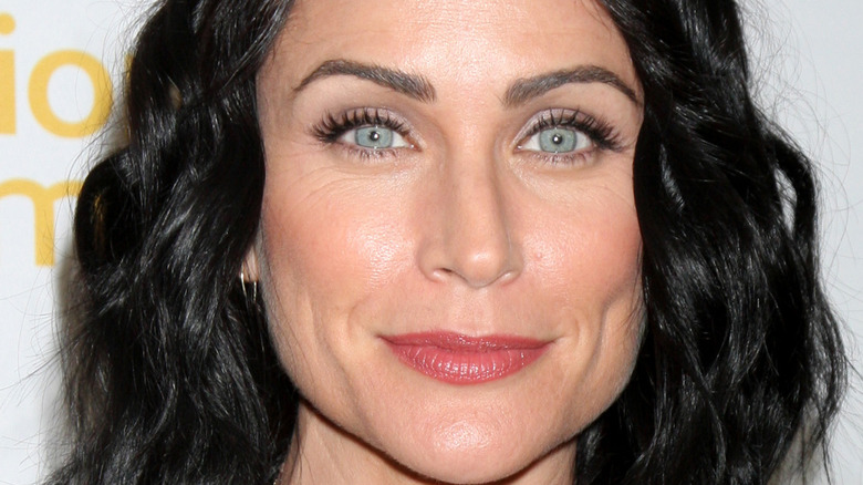 Rena Sofer smiling