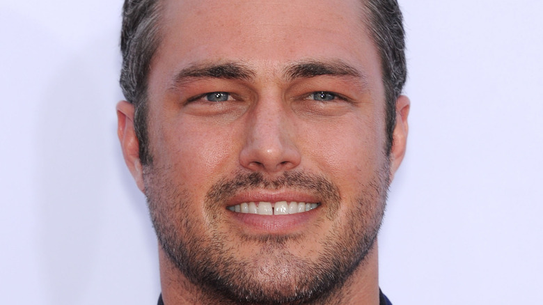 Taylor Kinney smiling 